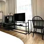 Beige Poshtels + Netflix